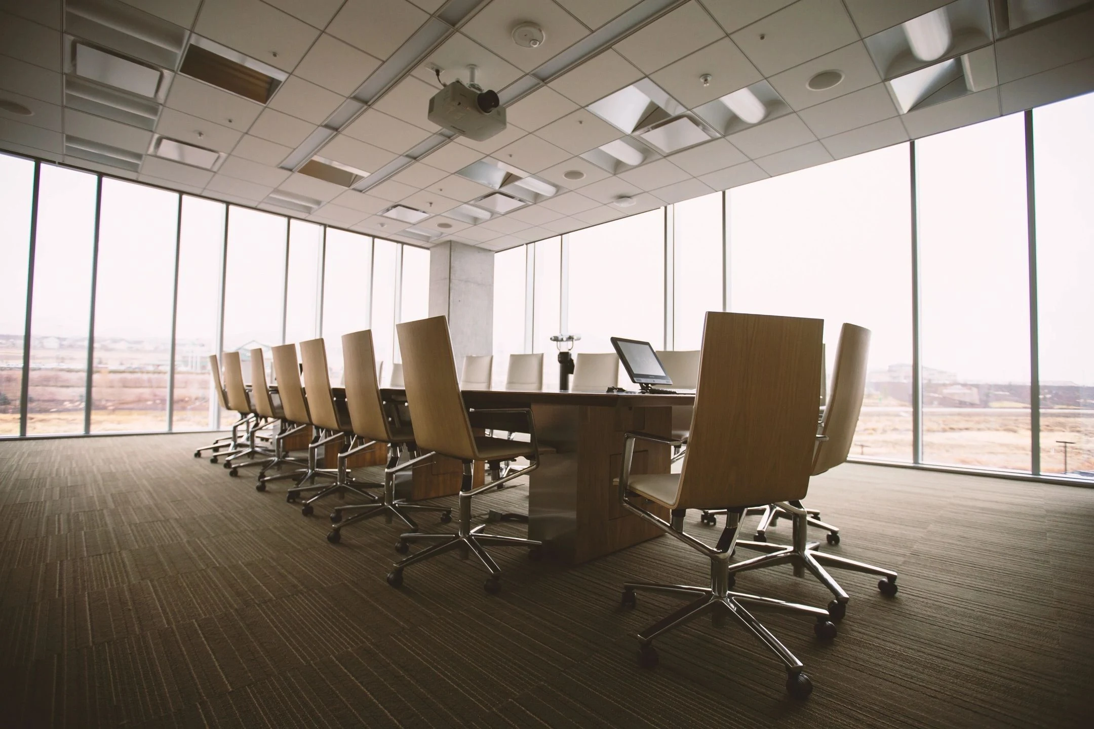 A warm, naturally lit boardroom